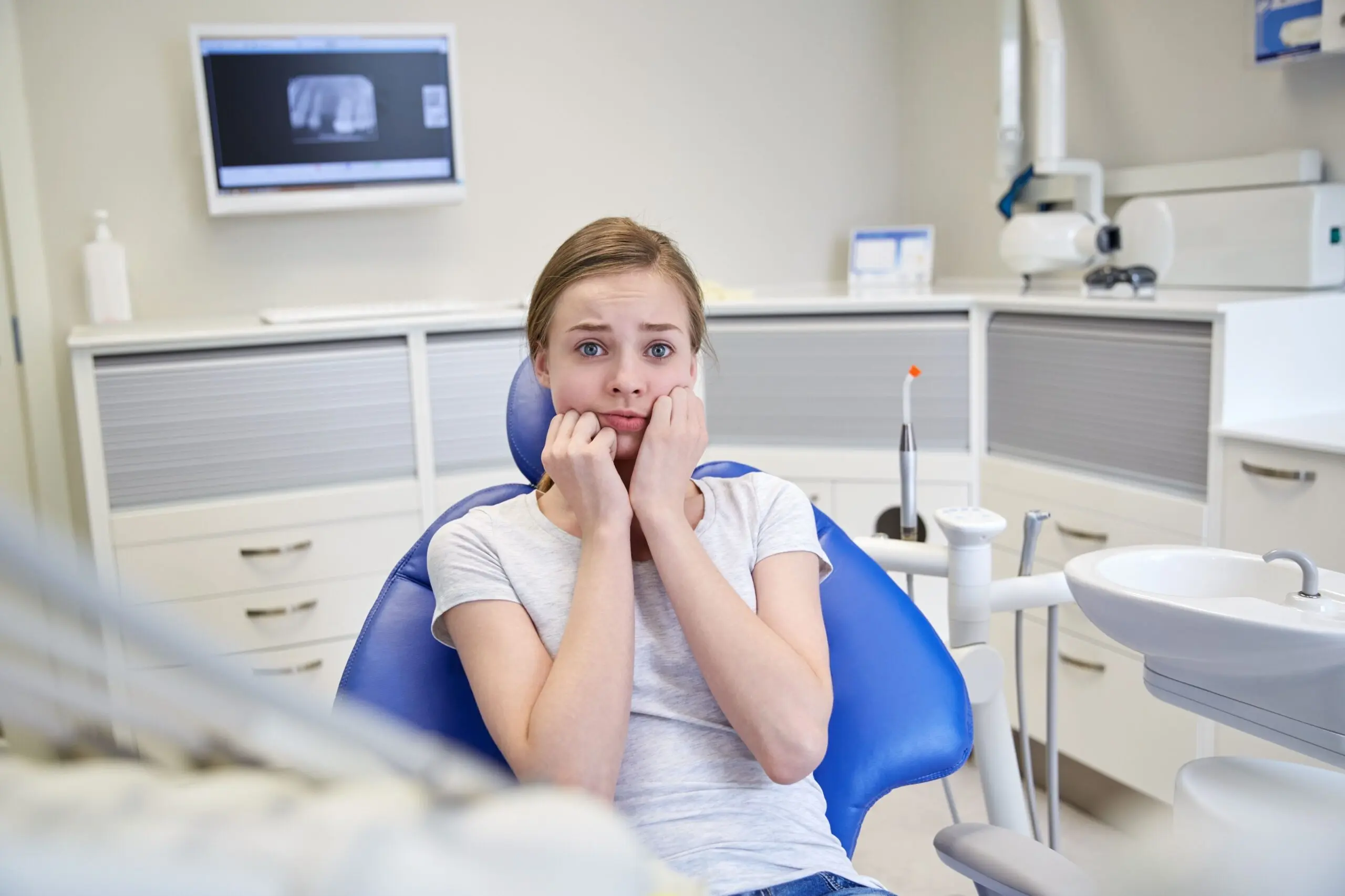 A Patient In The Orthodontist Chair Wondering If Braces Hurt Scaled
